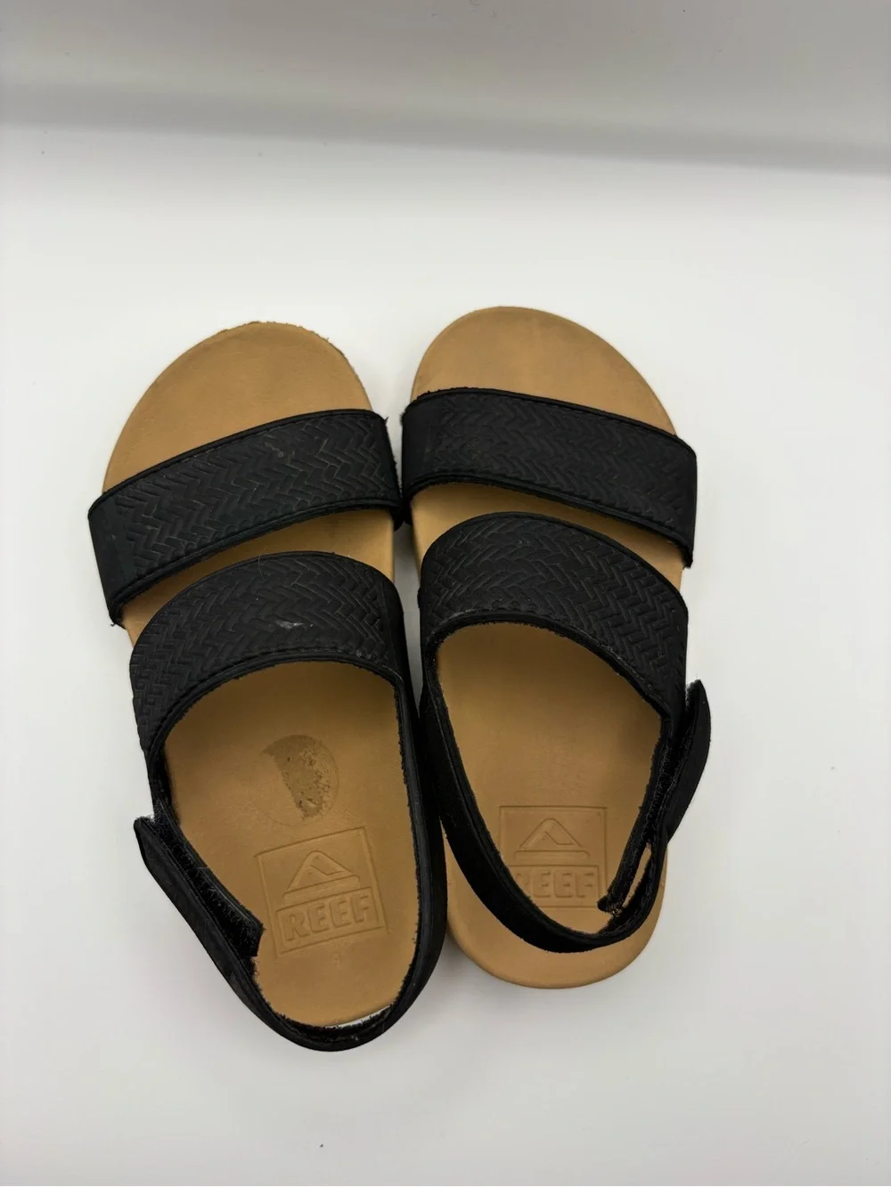 Reef Women’s Black and Tan Double-Strap Sandal